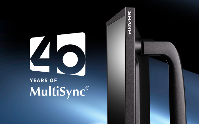 A large format display and a logo marking 40 years of MultiSync